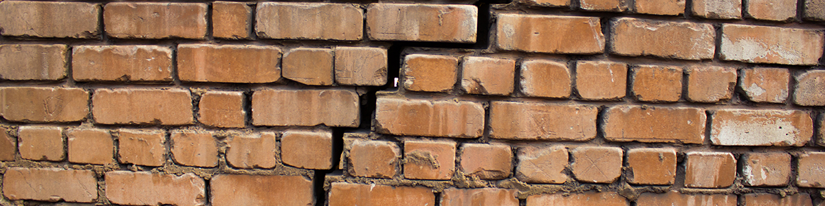 Damaged brick wall